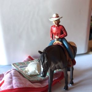 A loot of Breyer horse accessories